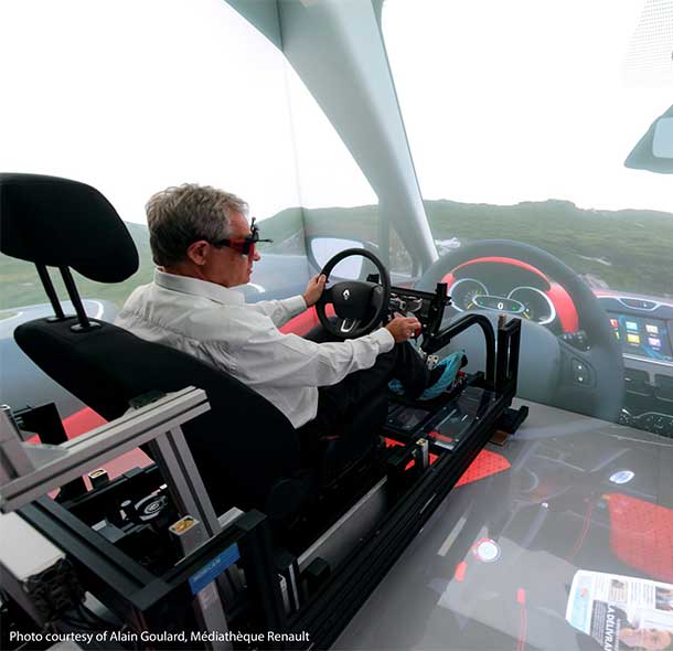 Man immersed in a Mechdyne CAVE solution - driving simulator virtual reality
