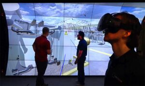 large virtual reality wall connected to head mounted virtual reality device