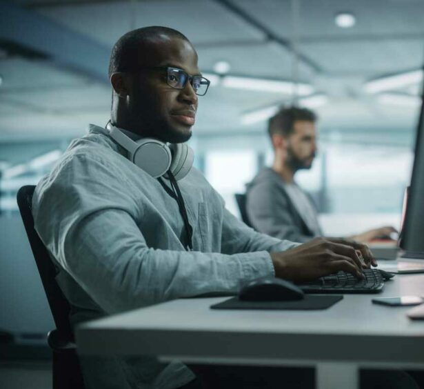 Embedded IT Services - men working in front of computer